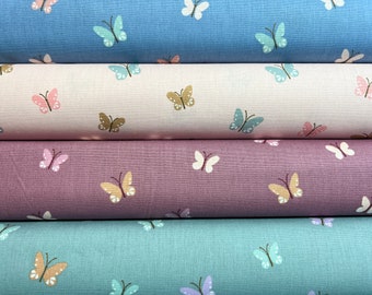 Tissu en coton popeline papillons menthe, bleu, rose et mauve / rouge / bordeaux