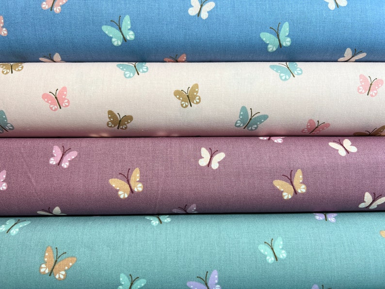 Cotton fabric with butterflies poplin in mint, blue, pink and mauve / red / burgundy image 1