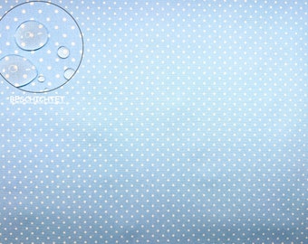 Coated cotton fabric with small dots 2 mm / petits in light blue