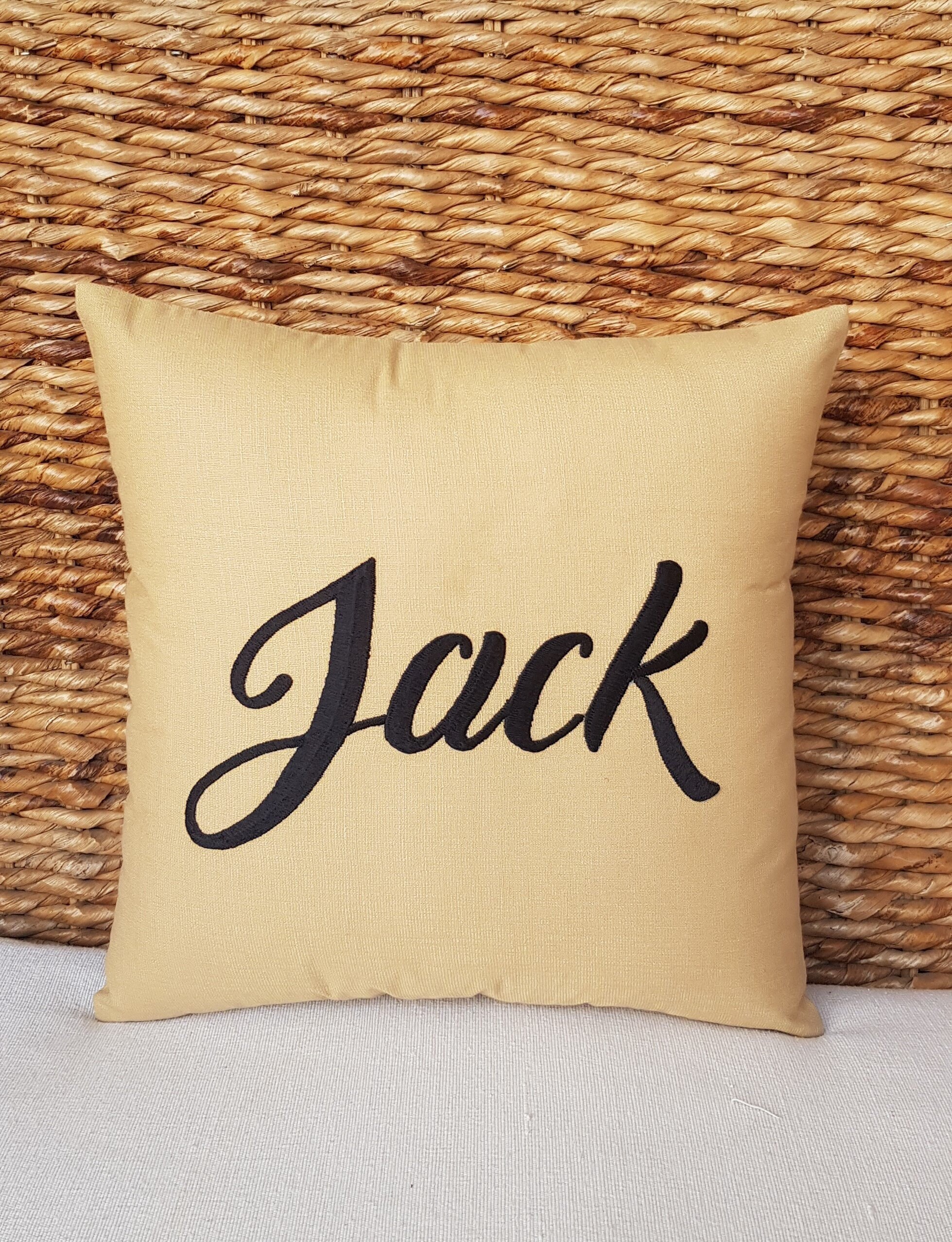 embroidered initial pillows