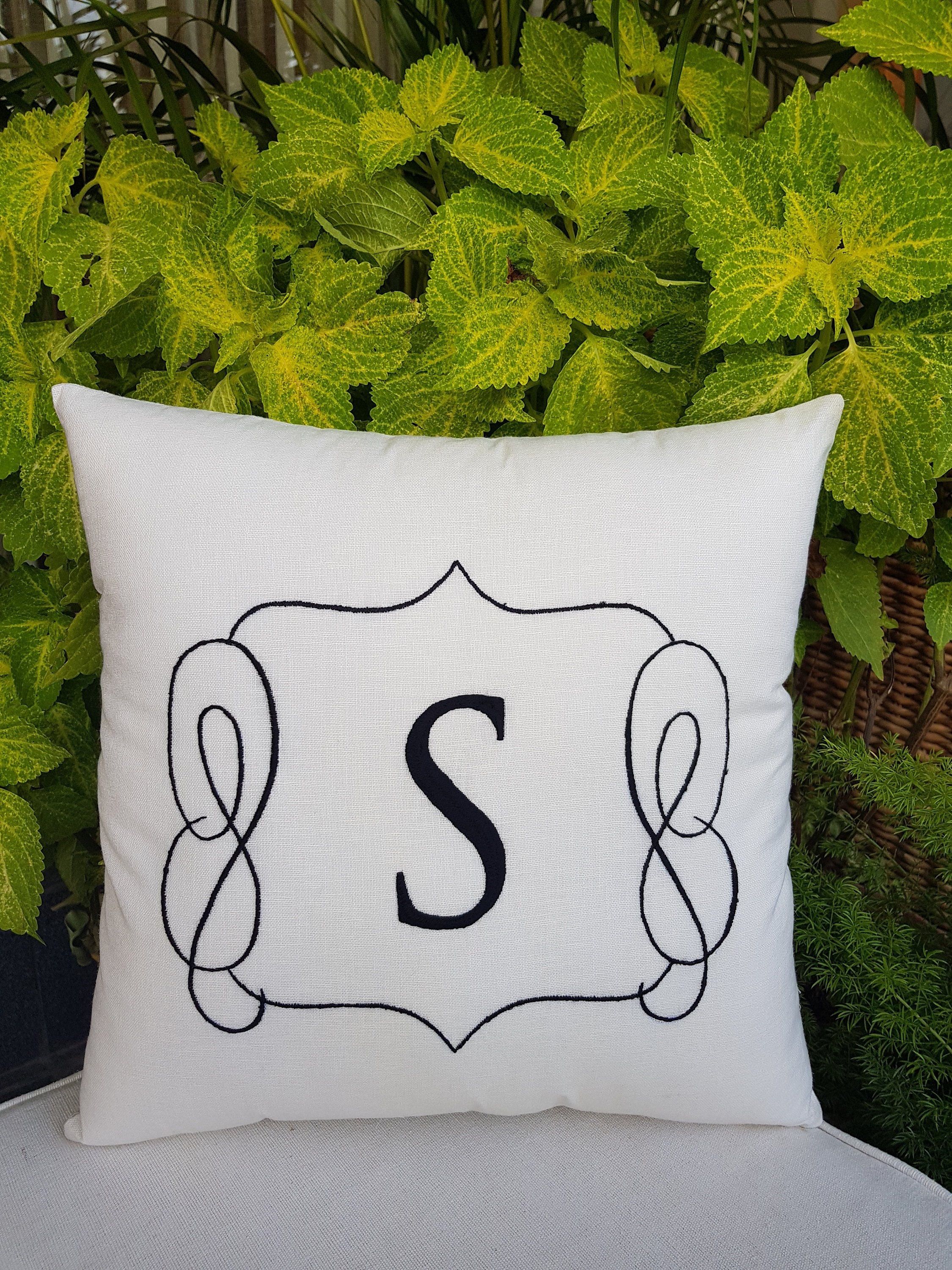 embroidered initial pillows