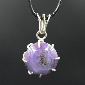 Star ruby silver pendent