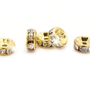 Spacer beads with rhinestones in gold-colored 6 mm 20 pieces