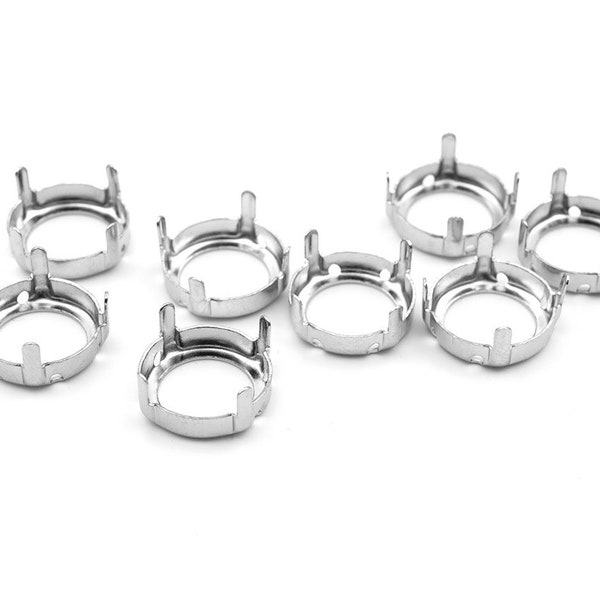 0.29 EUR/pc. Clamp settings for 14 mm cabochons in platinum color 8 pieces.