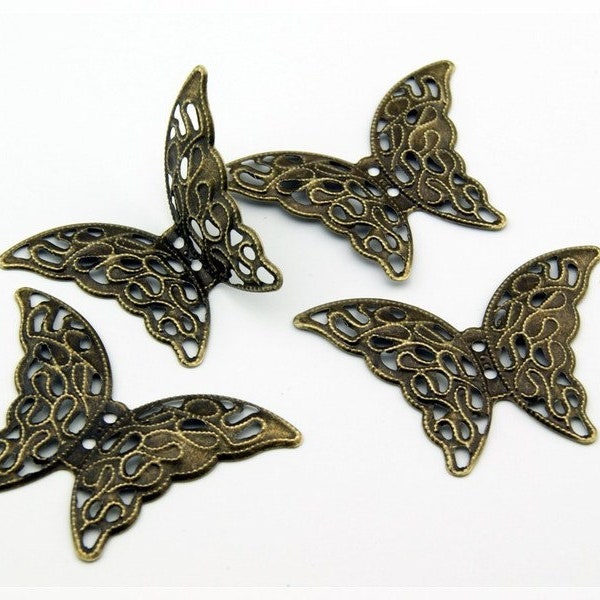 0,23 EUR/pièce. 10 papillons filigranes bronze vintage