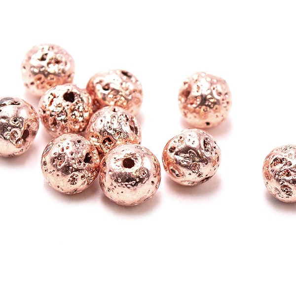0.31 EUR/piece Lava stone beads in rose gold colour coated 7 mm 10 pieces
