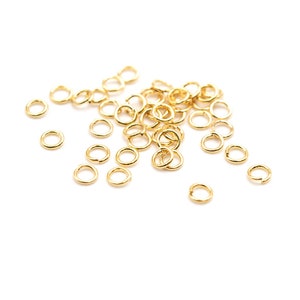 0.05 EUR/piece Vintageparts DIY jump rings made of brass with 18k gold coating 2.5 mm 50 pieces
