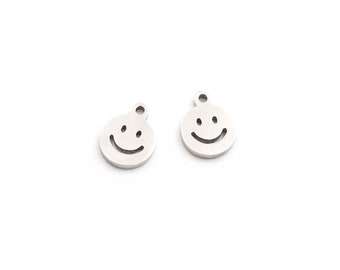 1.55 EUR/pc. Vintageparts DIY pendant as a smiley made of 304 stainless steel, 2 pieces