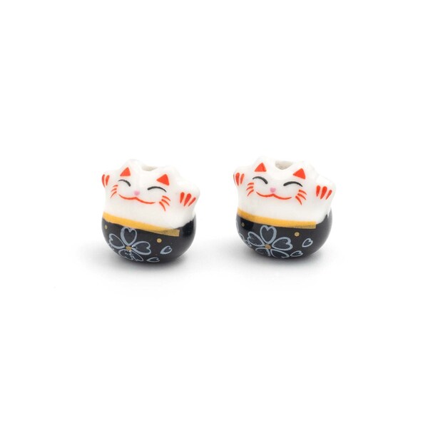 2,29 EUR/pièce. Perles en porcelaine en forme de chat porte-bonheur en noir et blanc 13 mm 2 pièces de Vintageparts pour réaliser des bijoux