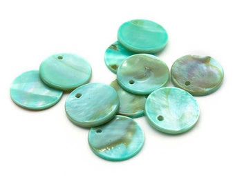 0.27 EUR/pc. Mother of pearl plates as pendants 16 mm in turquoise, 10 pieces