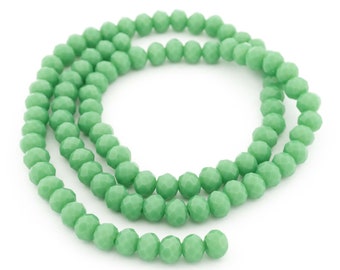 Glass cut beads in apple green 6 x 4 mm 1 strand with 94 beads handmade jewelry vintageparts DIY