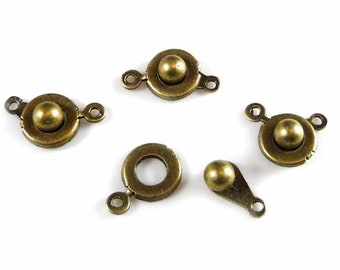 0.45 EUR/pc. 6 bronze clasps, clip closure