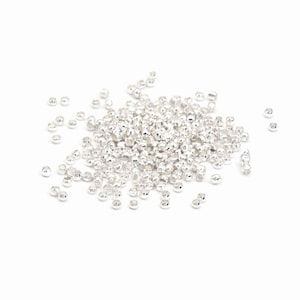 200 krimpkralen in zilverkleur, 2 mm