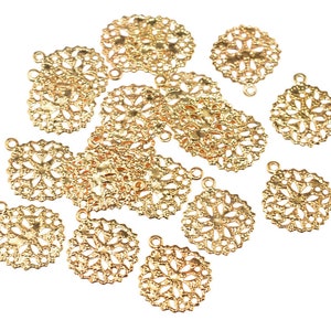 0.22 EUR/piece filigree small pendants in gold colour 10 pieces