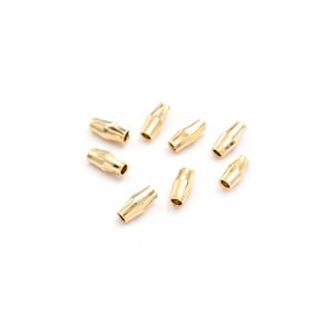 0.42 EUR/piece. Rhombus-shaped spacer beads made of brass, 24k gold plated, 6 x 3 mm, 8 pieces.