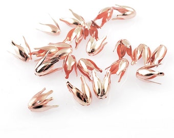 0,12 EUR/ud. 20 capuchones de perlas en forma de tulipán, color oro rosa melocotón