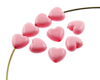 0,11 EUR/pièce. 20 perles coeur en acrylique rose, 11 mm
