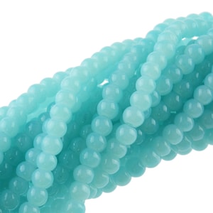 0,02 EUR/stuk 100 kleine glazen kralen in aquamarijn 4 mm