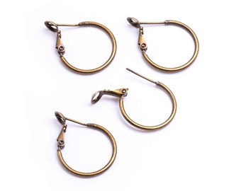 0.92 EUR/pc. Hoop earrings made of brass in antique bronze color 20 mm 4 pieces