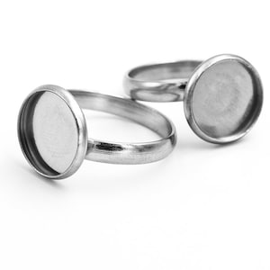 1.49 EUR/piece Vintageparts DIY ring blanks made of 304 stainless steel in platinum colour for 12 mm cabochons 2 pieces