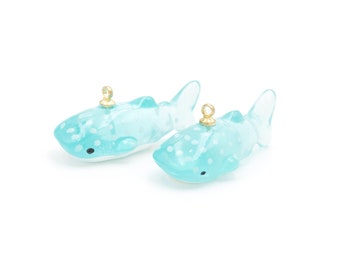 1.64 EUR/pc. Pendant as a whale shark made of resin in turquoise 2 pieces