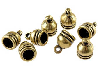 0.11 EUR/pc. End caps as bells in brass color for 5 mm ribbons, 20 pieces