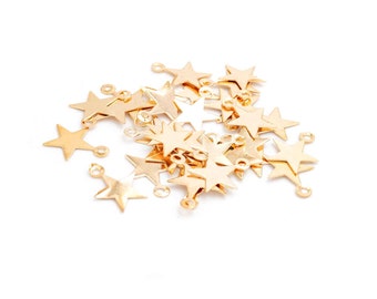 small star pendants in light gold-coloured 100 pieces 0,02 EUR/pc. Vintageparts DIY