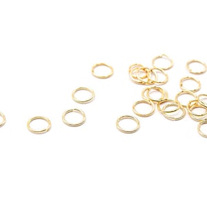 0.12 EUR/piece Vintageparts DIY jump rings made of brass with 18k gold coating 5 mm 20 pieces