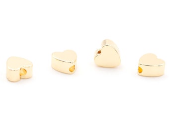 0.72 EUR/piece Beads as heart made of brass gold plated 4 pieces