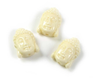 1,15 EUR/Stk. Perle als Kopf des Buddha aus synthetischer Koralle in weiß 2 Stück