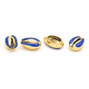 0.85 EUR/piece. Cowrie shell beads in blue and gold, 4 pieces.