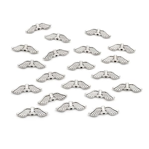 0,17 EUR/Stk. Engelsflügel in antik silberfarben 21mm 20 Stück