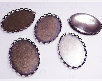 0,54 EUR/Stk. 5 Fassungen in antik bronze für 25 x 18 mm Cabochons