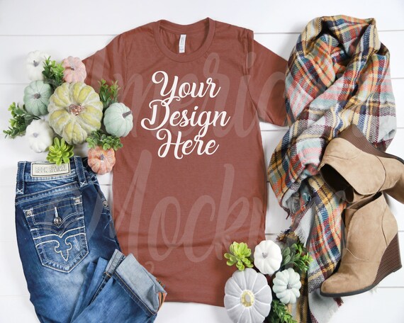 Bella Heather Rust 3001 short sleeve crew neck t shirt on wood background mockup flatlay scene photography. Bella Heather Rust 3001 short sleeve crew neck t shirt on wood background mockup flatlay scene photography.