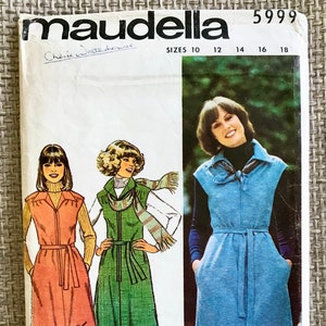 May include: A vintage sewing pattern for a sleeveless dress with a tie belt. The pattern is for sizes 10-18 and is called "Maudella" by Cherie Waterhouse. The pattern shows three different versions of the dress in pink, green, and blue.