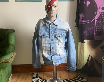 Vintage Lee Denim Jacket in a bleached wash and trucker style large with a 42" chest.