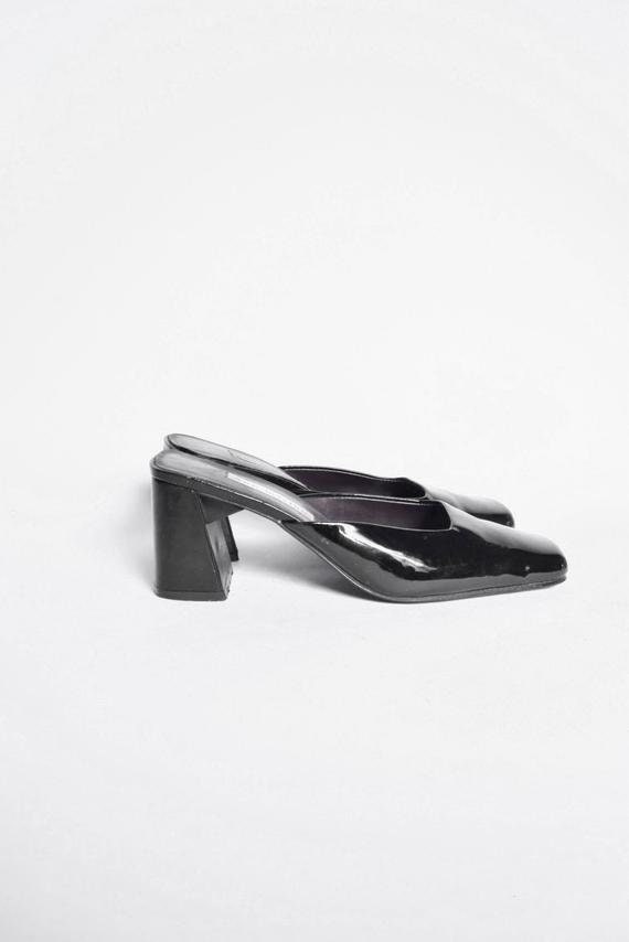 shiny black clogs