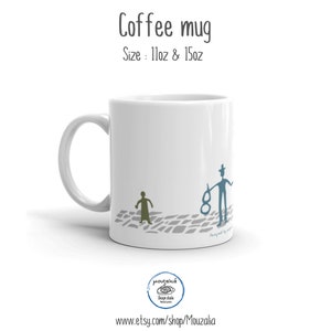 May include: A white ceramic coffee mug featuring the text Coffee mug and Size: 11oz & 15oz at the top. The mug displays a graphic of a small olive-colored figure and a blue figure wearing a hat on a gray cobblestone path pattern.