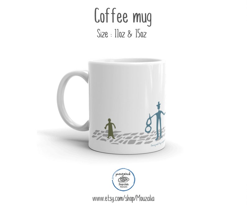 May include: A white ceramic coffee mug featuring the text Coffee mug and Size: 11oz & 15oz at the top. The mug displays a graphic of a small olive-colored figure and a blue figure wearing a hat on a gray cobblestone path pattern.