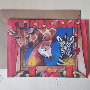 Christmas greeting card with giraffe, okapi and zebra