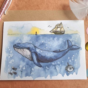Carte de voeux baleine bleue dans la mer