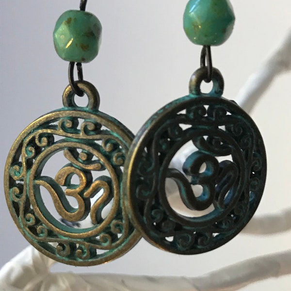 The sacred OM symbol and greatest of all mantras, or sacred formulas Brass Stamping and Unique Czech Bead.