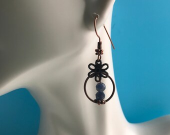 Genuine Natural Sapphires and cute little copper flowers make these the perfect work to play earrings.  Petite, Unique, and Adorable.