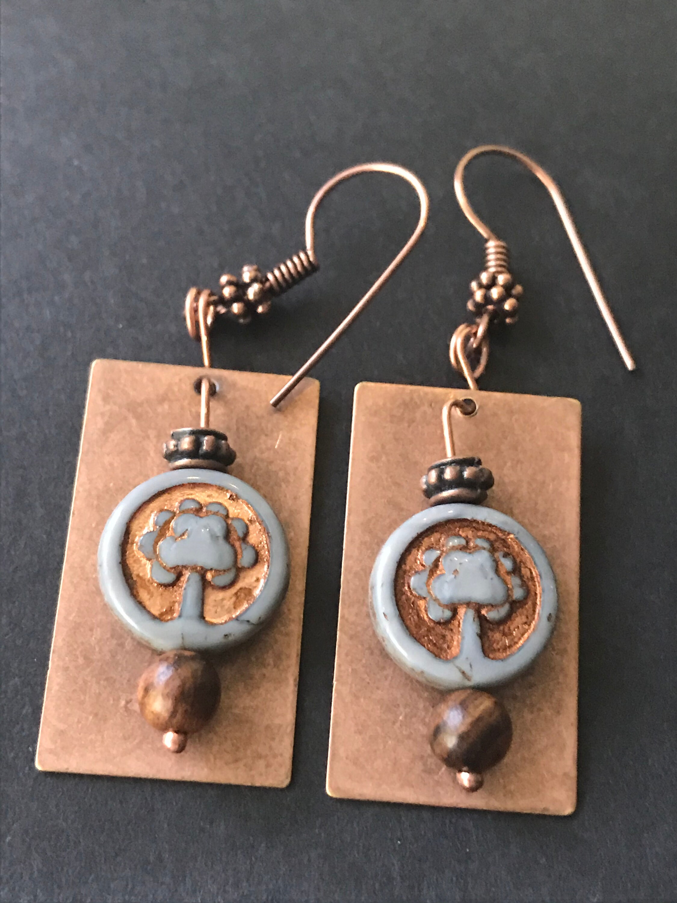 The tree of life is a symbol of strength and tenacity.  Make a statement with these exquisite Czech bead and Copper Earrings.