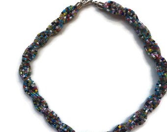 Multicoloured beaded confetti necklace. Multi strand necklace. Colourful jewellery. Dopamine dressing. Summer outfits. Womenswear.