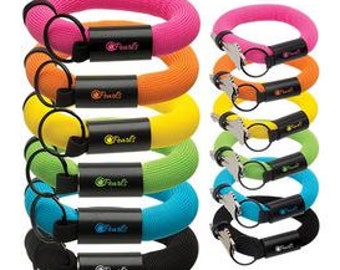 May include: Assortment of colorful, woven keychains with a black metal ring and a black plastic insert with the word "Pearl" printed on it.