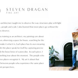 May include: A man stands in front of a fireplace holding a framed watercolor painting of a grand interior space. The painting features a high ceiling with intricate details and a large window. The text "STEVEN DRAGAN FINE ART" is visible at the top of the image.