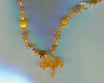 handmade beaded necklace orange with pendant donkey size. 48