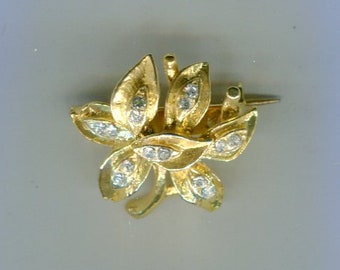 Broche años 80 flor strass dorada 20 mm