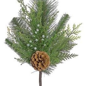 May include: Artificial evergreen holiday pick featuring a brown pinecone at the center, surrounded by various green pine needles and sprigs. The pick has a dark brown stem. Ideal for seasonal decor and crafting projects.